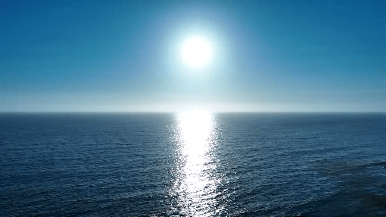Ocean and Sun in Sky Still